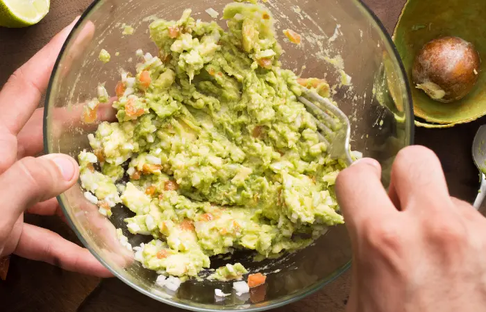 Mashing-cooked-vegetables