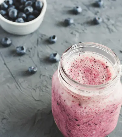 Berry smoothie in a mason jar