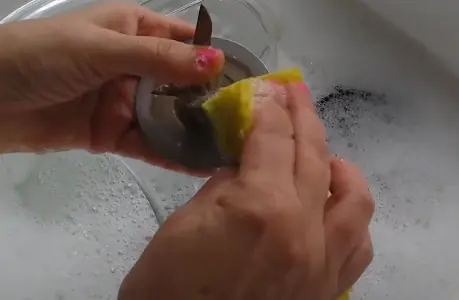 Washing-the-blade-with-soapy-water