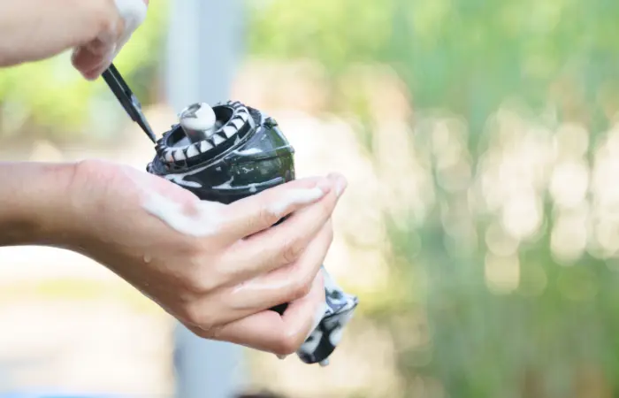 Hand-washing-a-sensitive-attachment-of-juicer