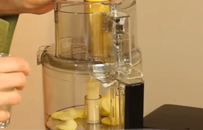 Slicing-fruit-evenly-in-food-processor