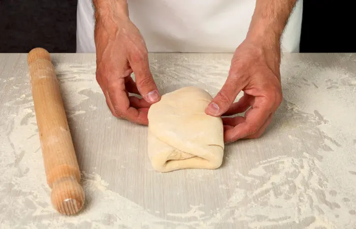 Folding the pastry in quarters